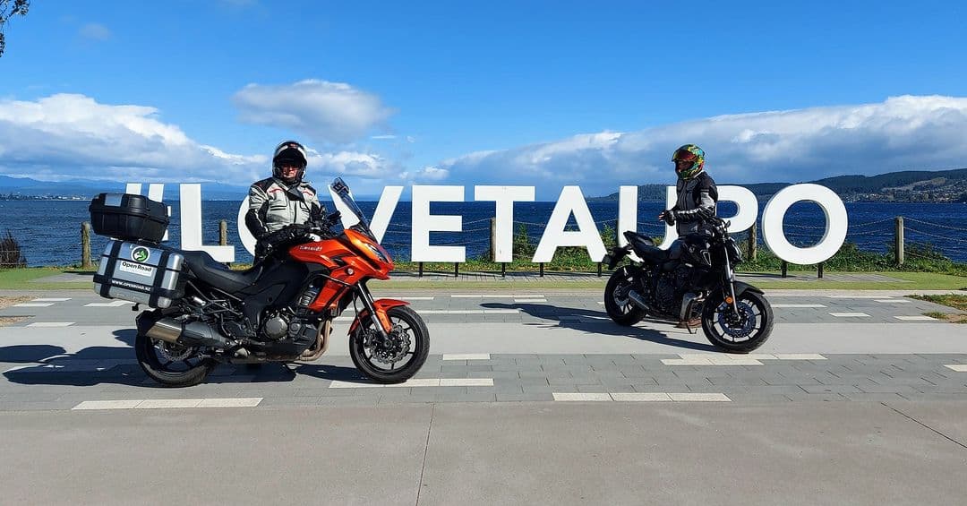 Family photo in front of some bikes